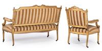 A Louis XVI Style Carved Giltwood Settee and Fauteuil