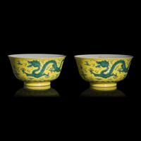 A Pair of Chinese Green Enameled Yellow Ground 'Dragon' Bowls, Guangxu Mark and of the Period — 清光緒 黃地綠彩雲龍紋碗一對