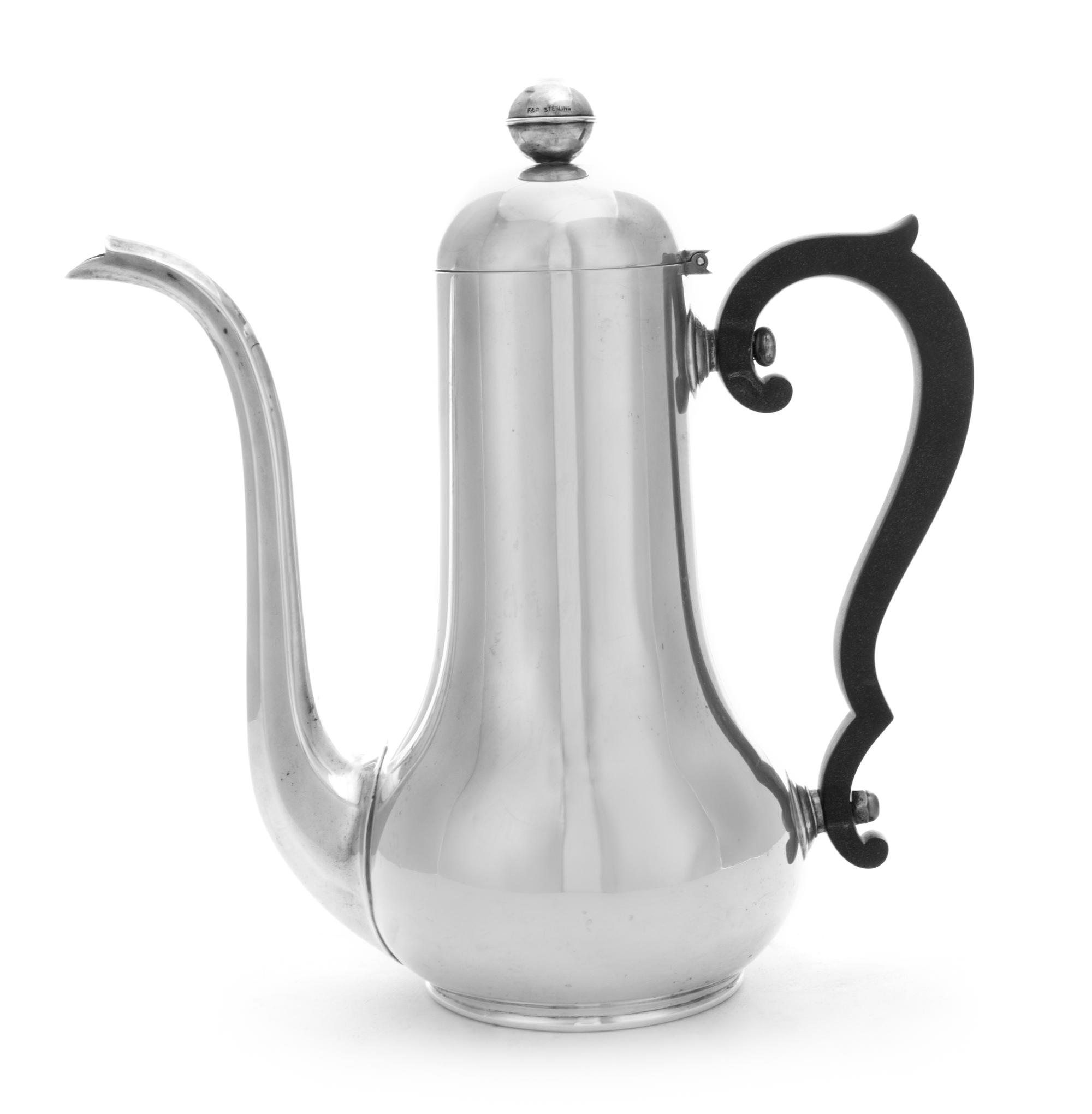 An American Silver Coffee Pot, Gorham Mfg. Co., Providence, RI, 1931, of baluster form, having a hinged lid and an applied wood handle.