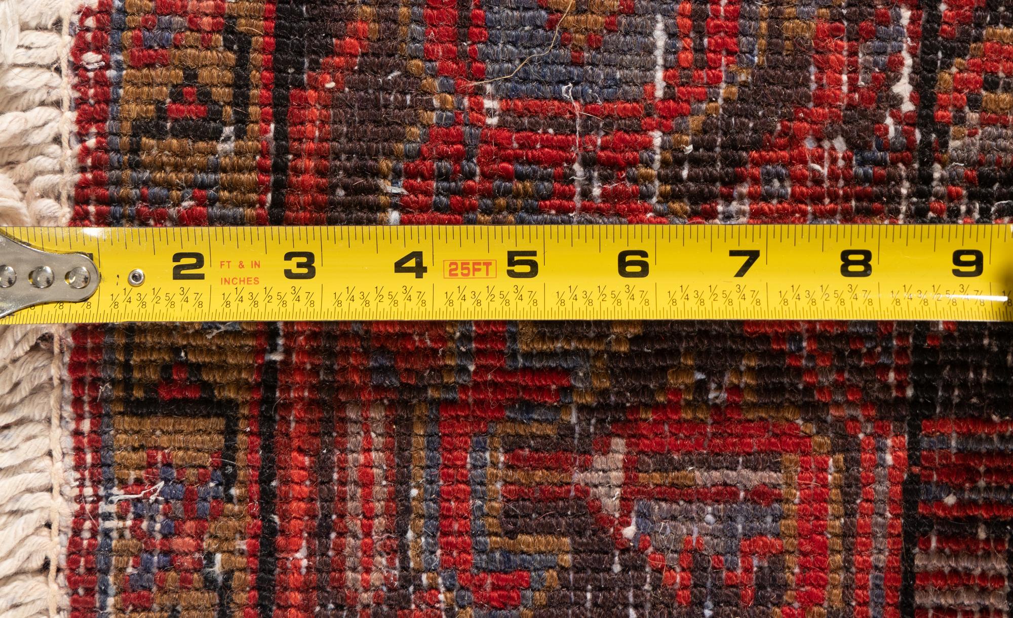 A Heriz Wool Rug
