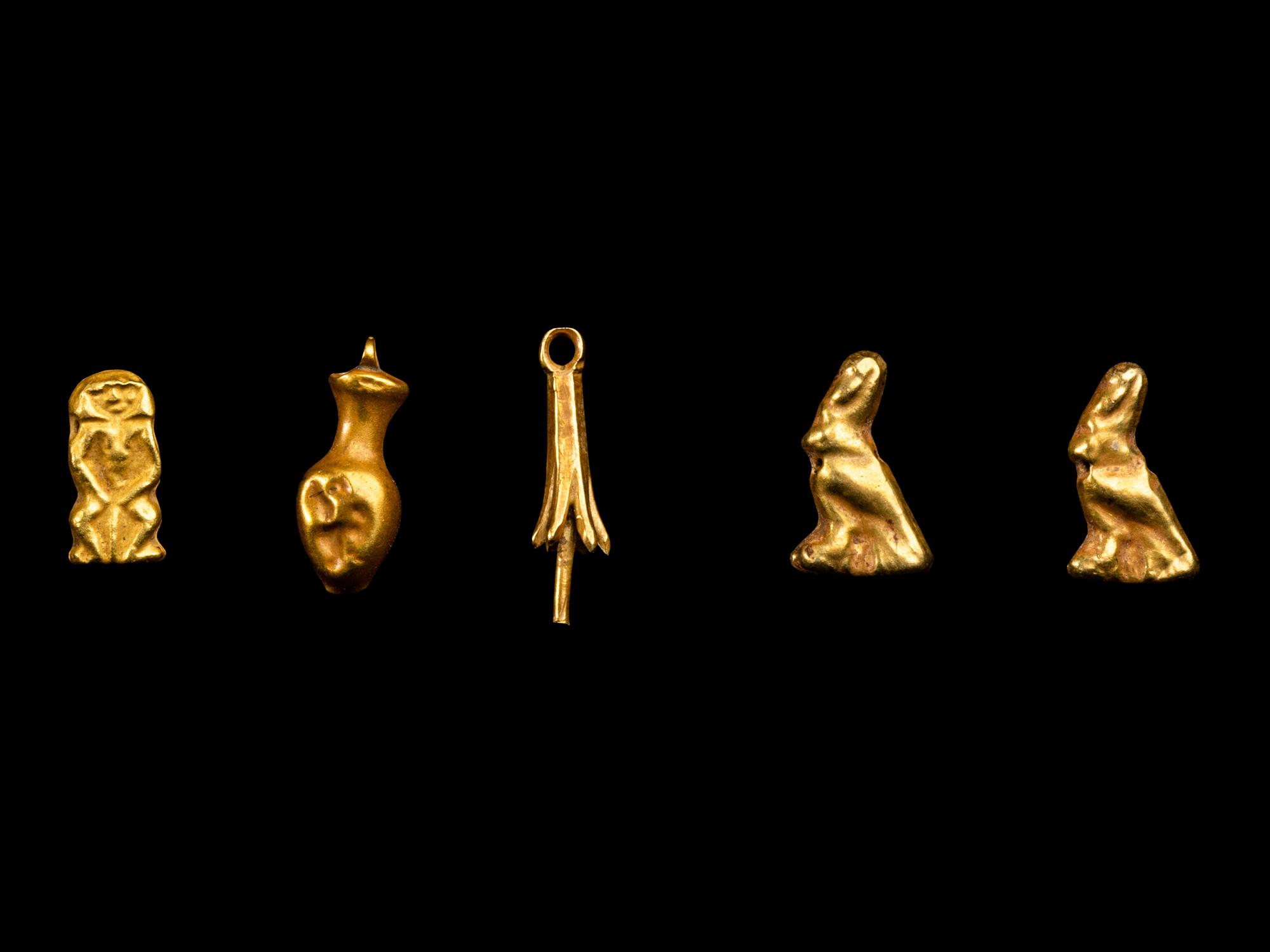 Five Egyptian Gold Amulets including Papyrus, Nefer, Bes and Horus