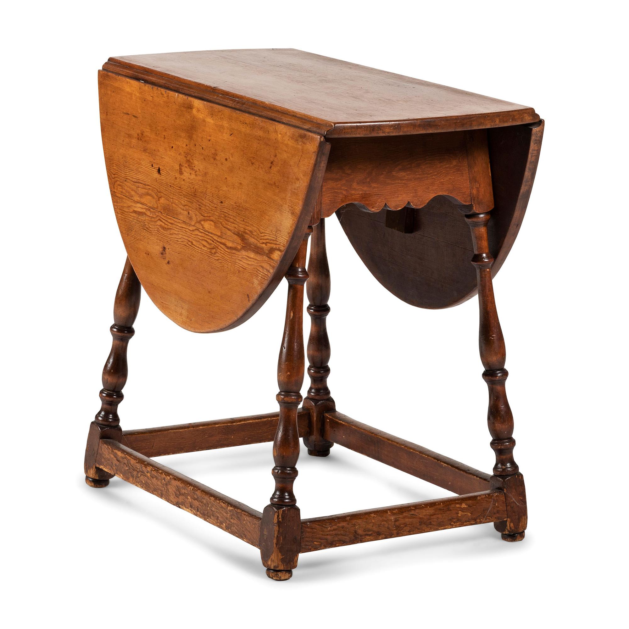 A William and Mary Carved and Turned Pine and Maple Drop-Leaf Splayed Leg Tavern Table