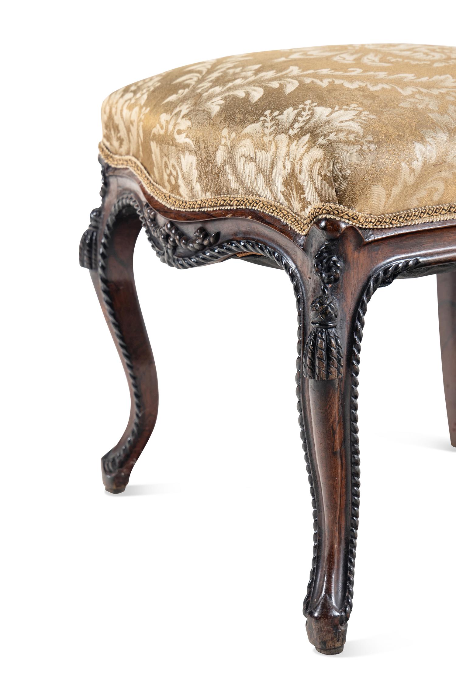 A Set of Four Rococo Revival Carved Balloon-Back Side Chairs