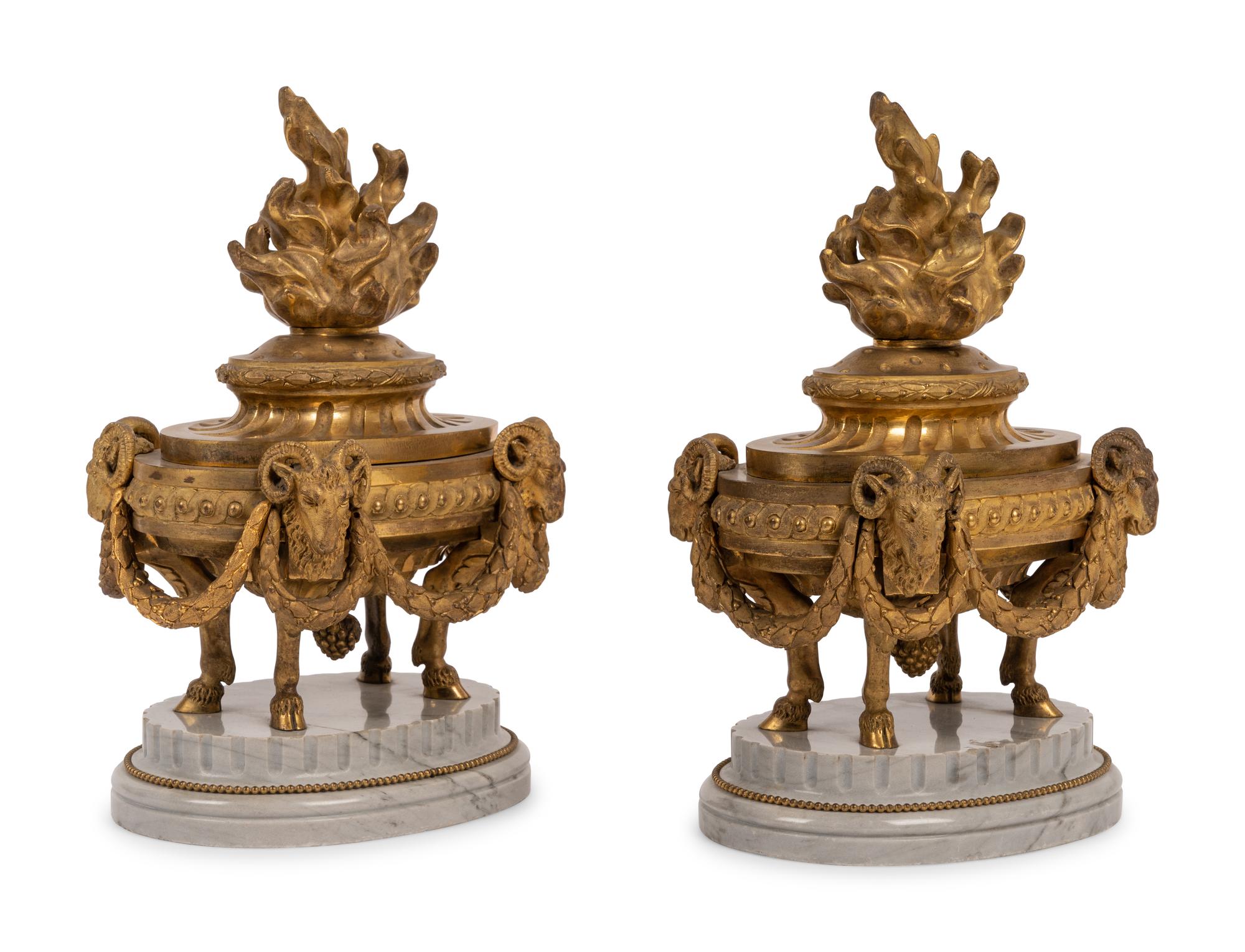 A Pair of French Neoclassical Gilt Bronze and Marble 'Flaming Urn' Ornaments