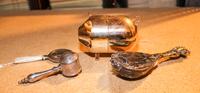 A Group of Silver and Silver-Plate Children's Articles, , comprising a Gorham mother-of-pearl and silver rattle, another silver rattle,