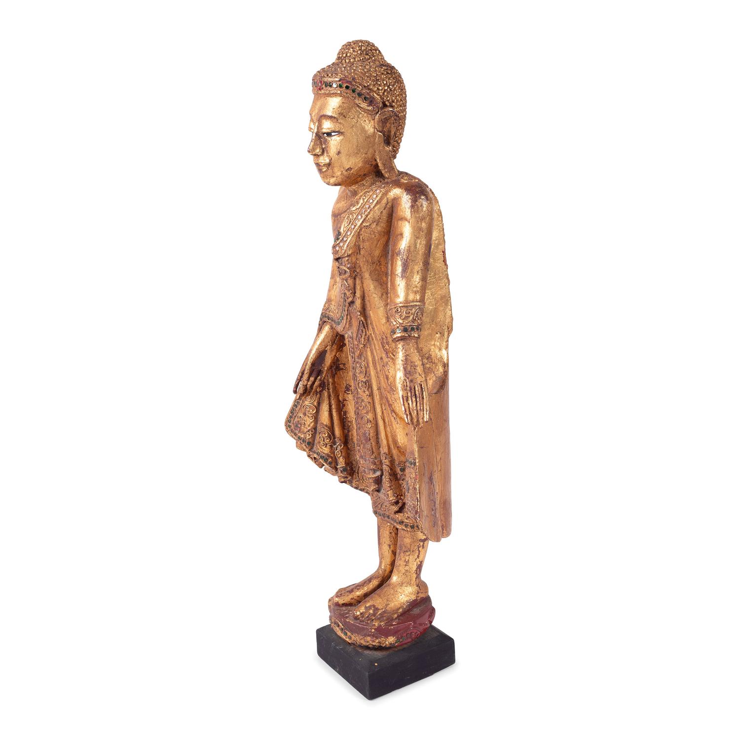 A Chinese Carved Gilt Wood Standing Buddha Figure