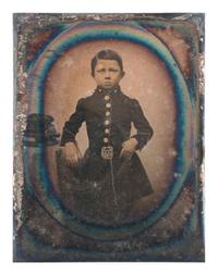 [EARLY PHOTOGRAPHY]. A pair of portraits of young boys dressed in military attire.