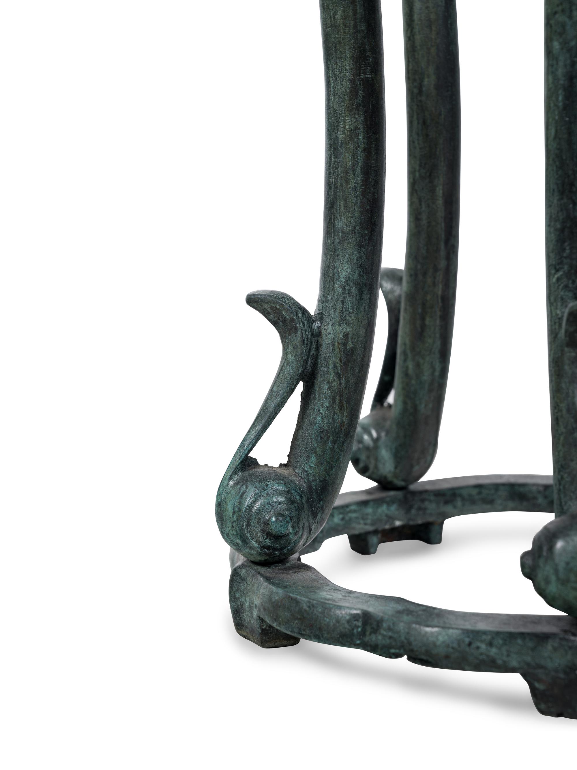 A Chinese Patinated Bronze Pedestal Table