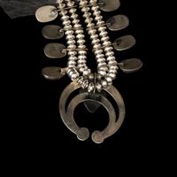 Carol and Wilson Begay (Diné, act. since 1969) — Sterling Silver and Sugilite Squash Blossom Necklace