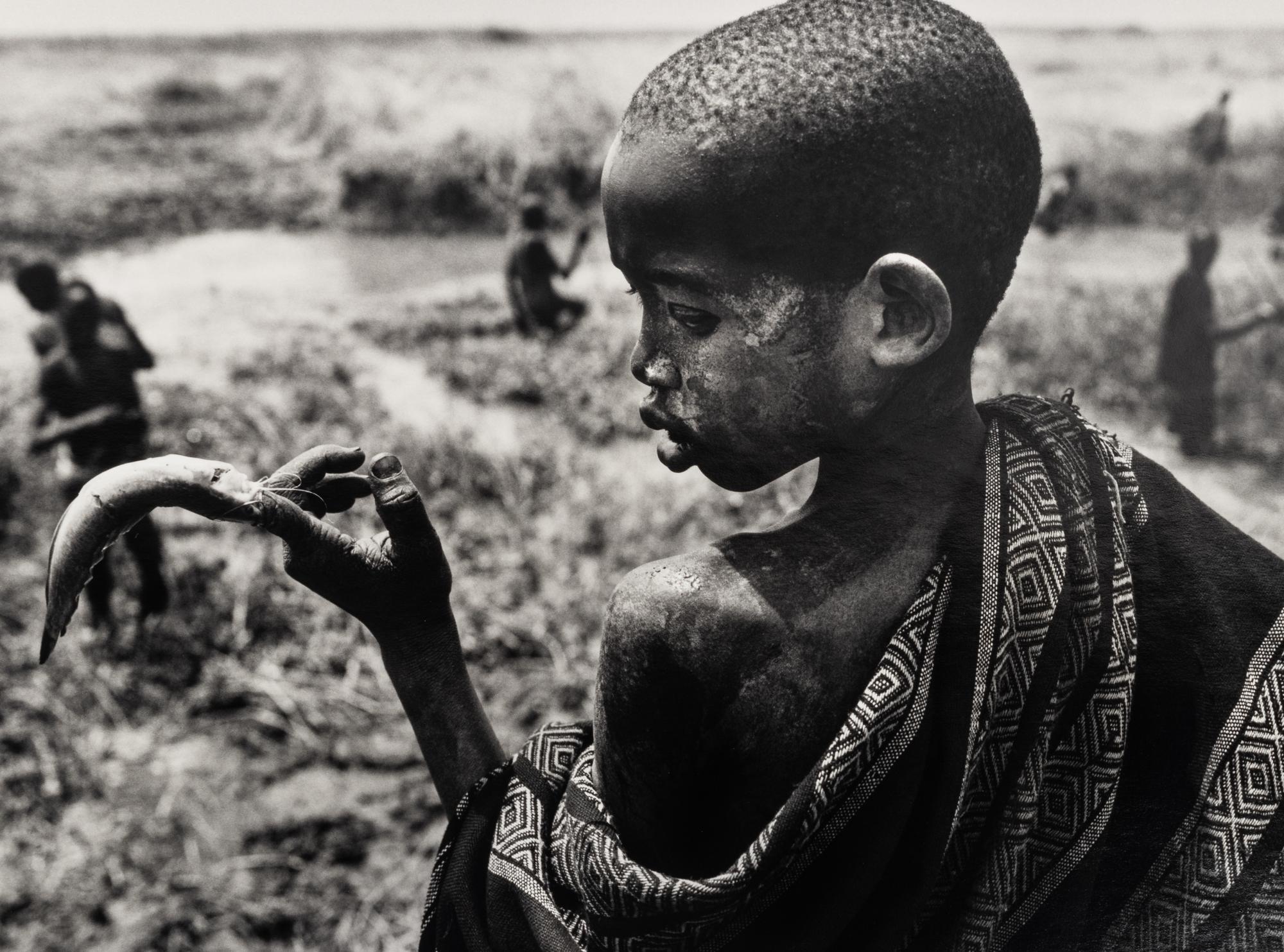 Sebastião Salgado (born 1944) Fishing in the marshes of the Gel Canal, which is filled with waters from the Nile River, Southern Sudan, from the series "Genesis," 2006