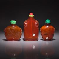 Three Chinese Amber Snuff Bottles, 18th to 19th Century — 清中期 琥珀鼻烟壺三支