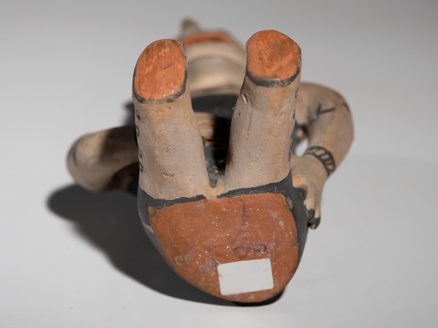 Seated Cochiti Pottery Figure
