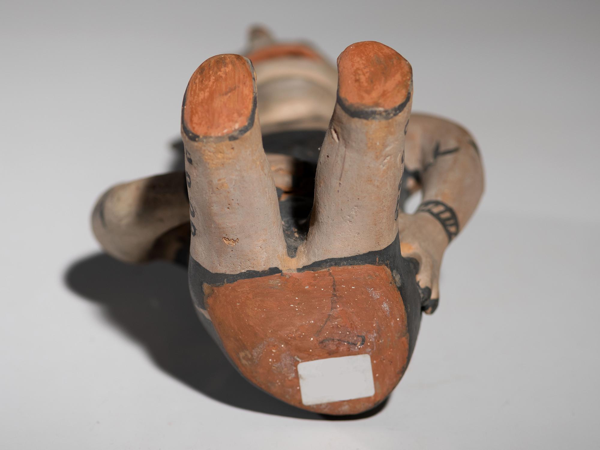 Seated Cochiti Pottery Figure