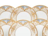 A Set of Twelve Mintons Pâte-sur-Pâte Parcel-Gilt Porcelain Plates