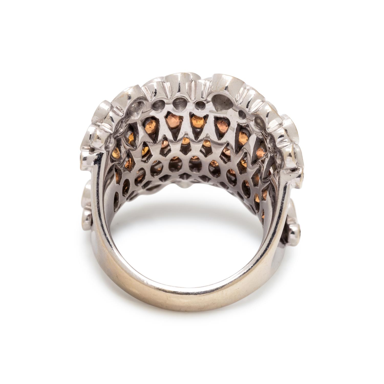STEFAN HEFNER, DIAMOND AND ORANGE SAPPHIRE 'CORSET' RING