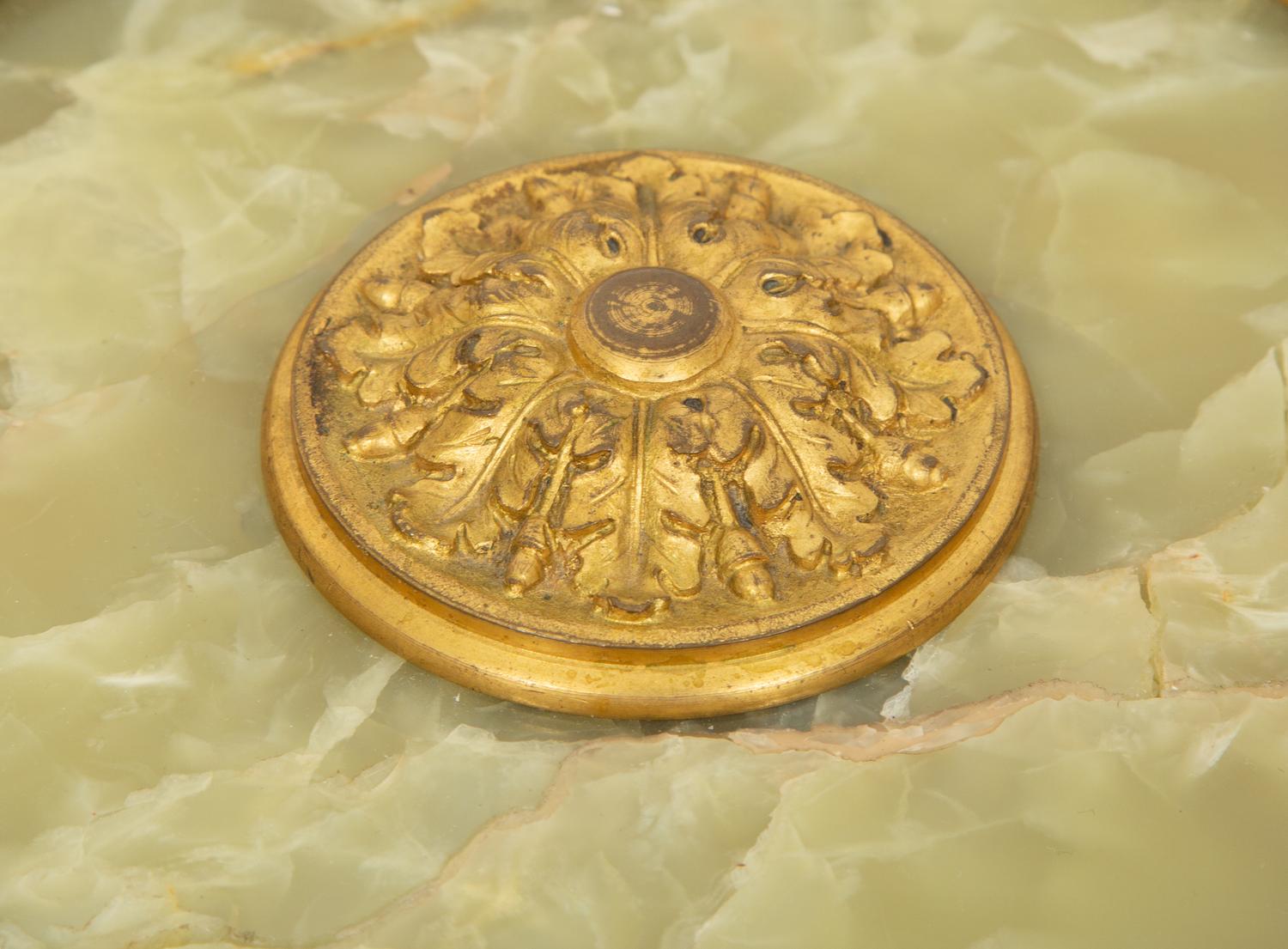 An Empire Style Patinated and Gilt Bronze Mounted Onyx Centerpiece