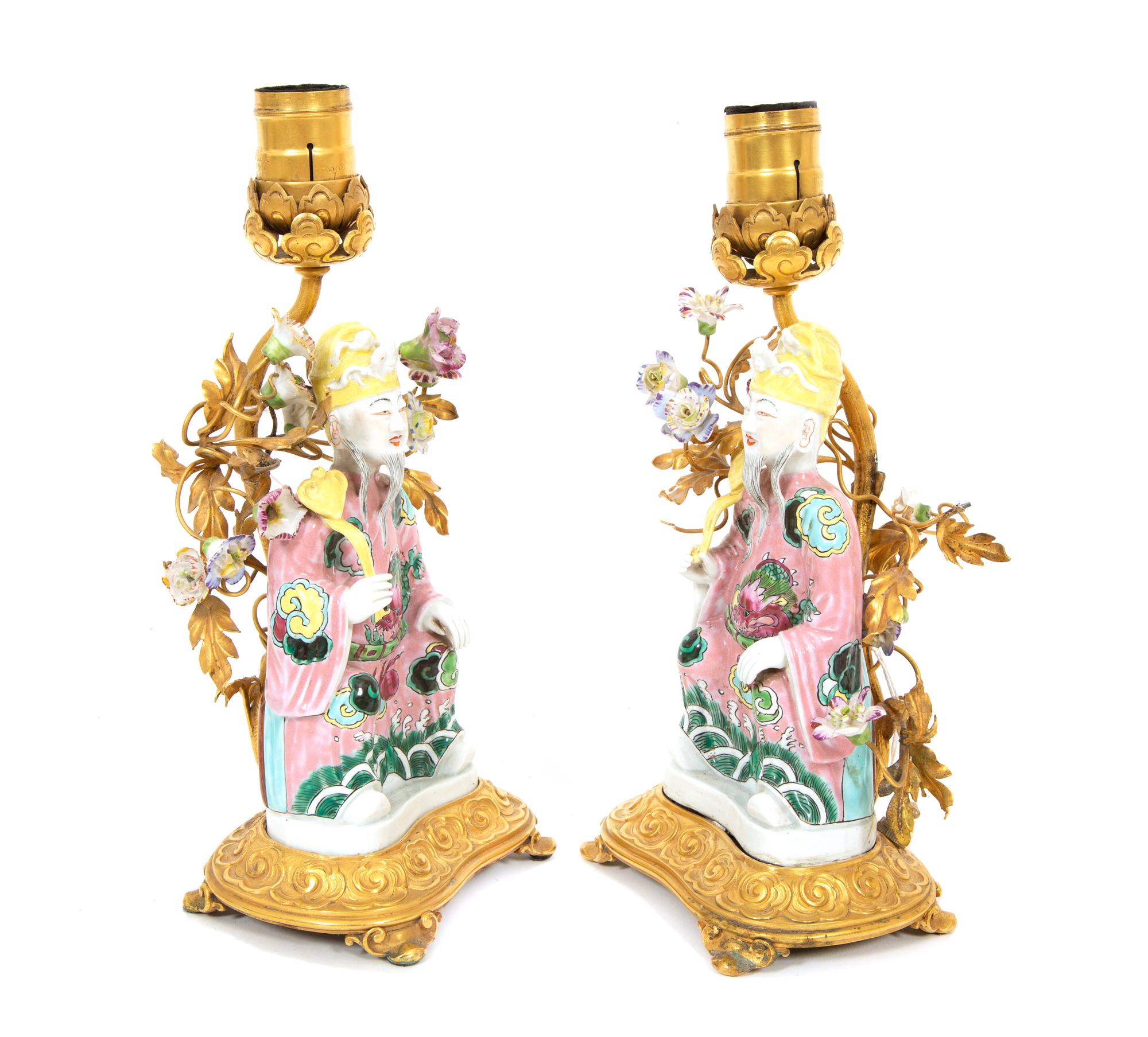 A Pair of Chinese Export Gilt Bronze Mounted Porcelain Figural Lamps