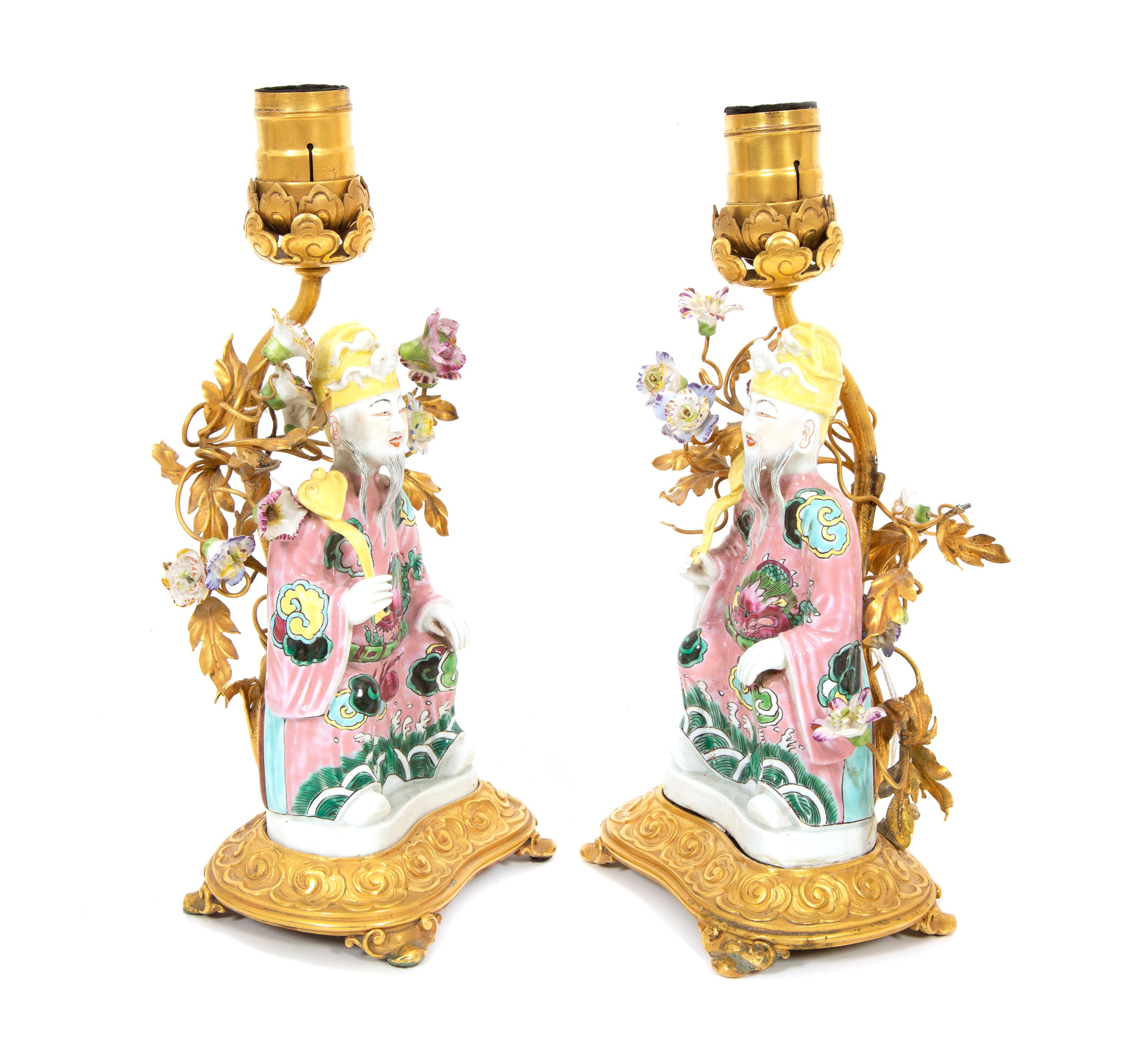 A Pair of Chinese Export Gilt Bronze Mounted Porcelain Figural Lamps