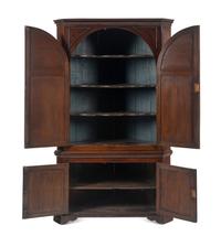 A George II Mahogany Corner Cabinet