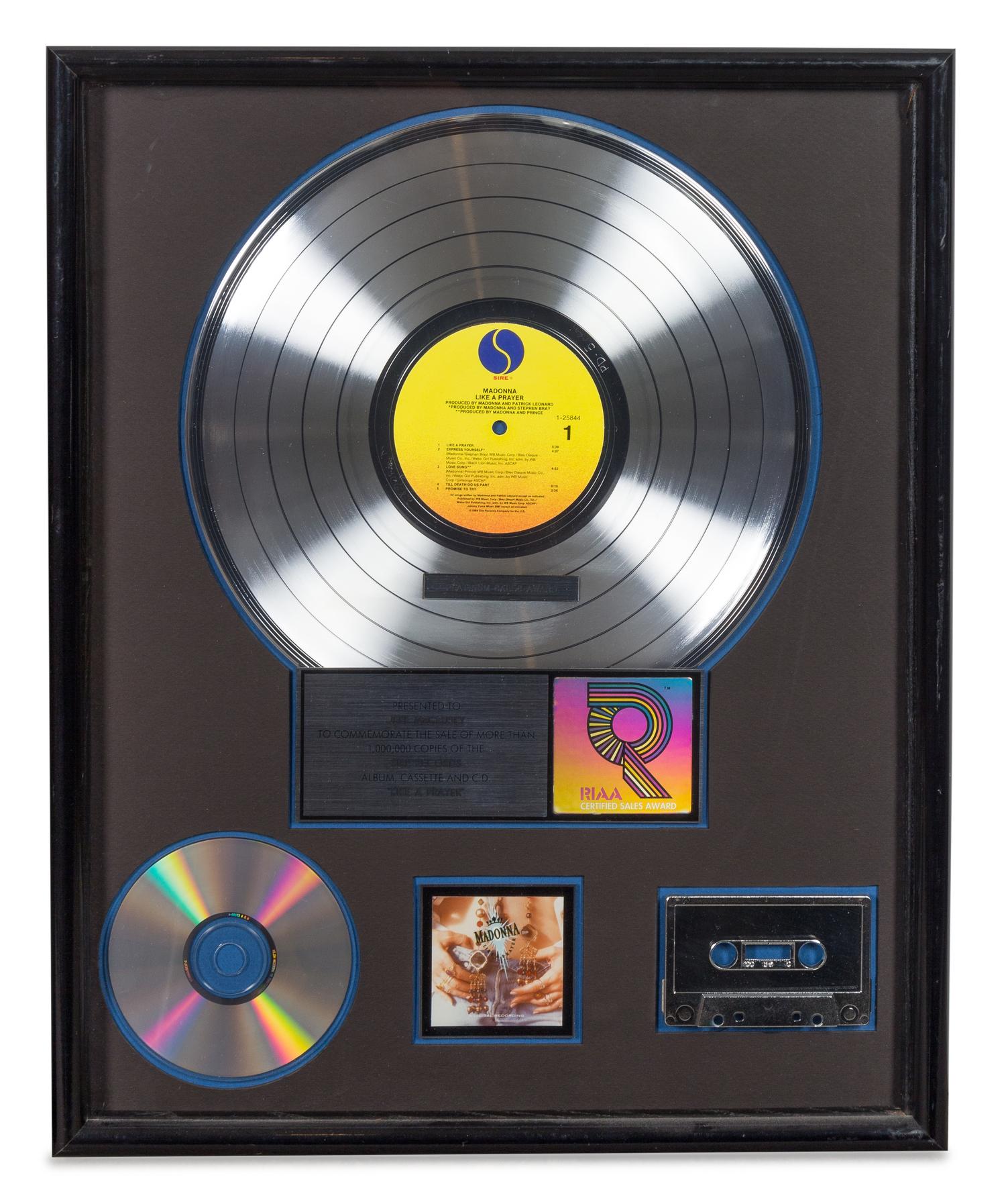 A Madonna: Like a Prayer RIAA Certified Platinum Presentation Album 21 x 17 inches.