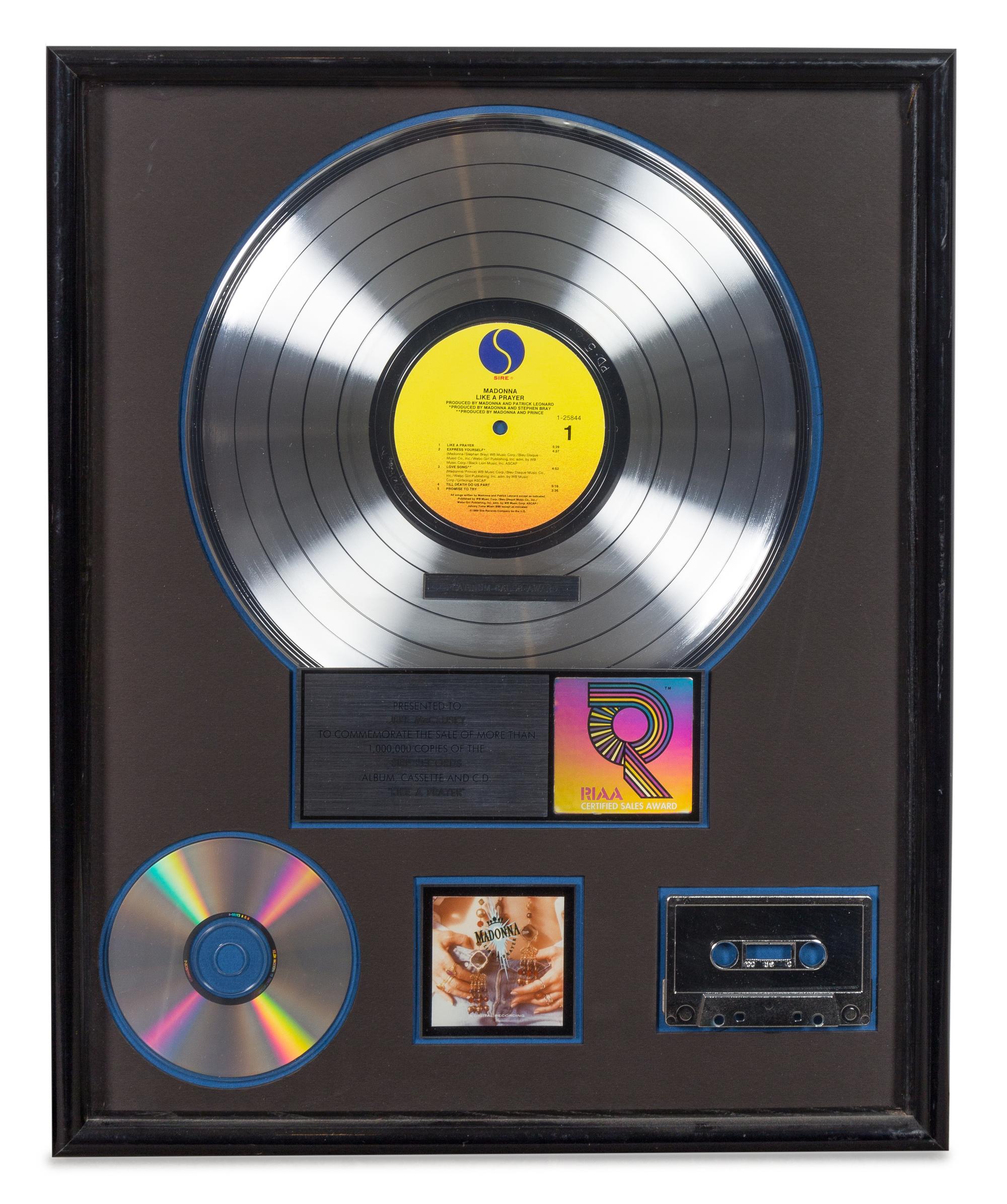 A Madonna: Like a Prayer RIAA Certified Platinum Presentation Album 21 x 17 inches.