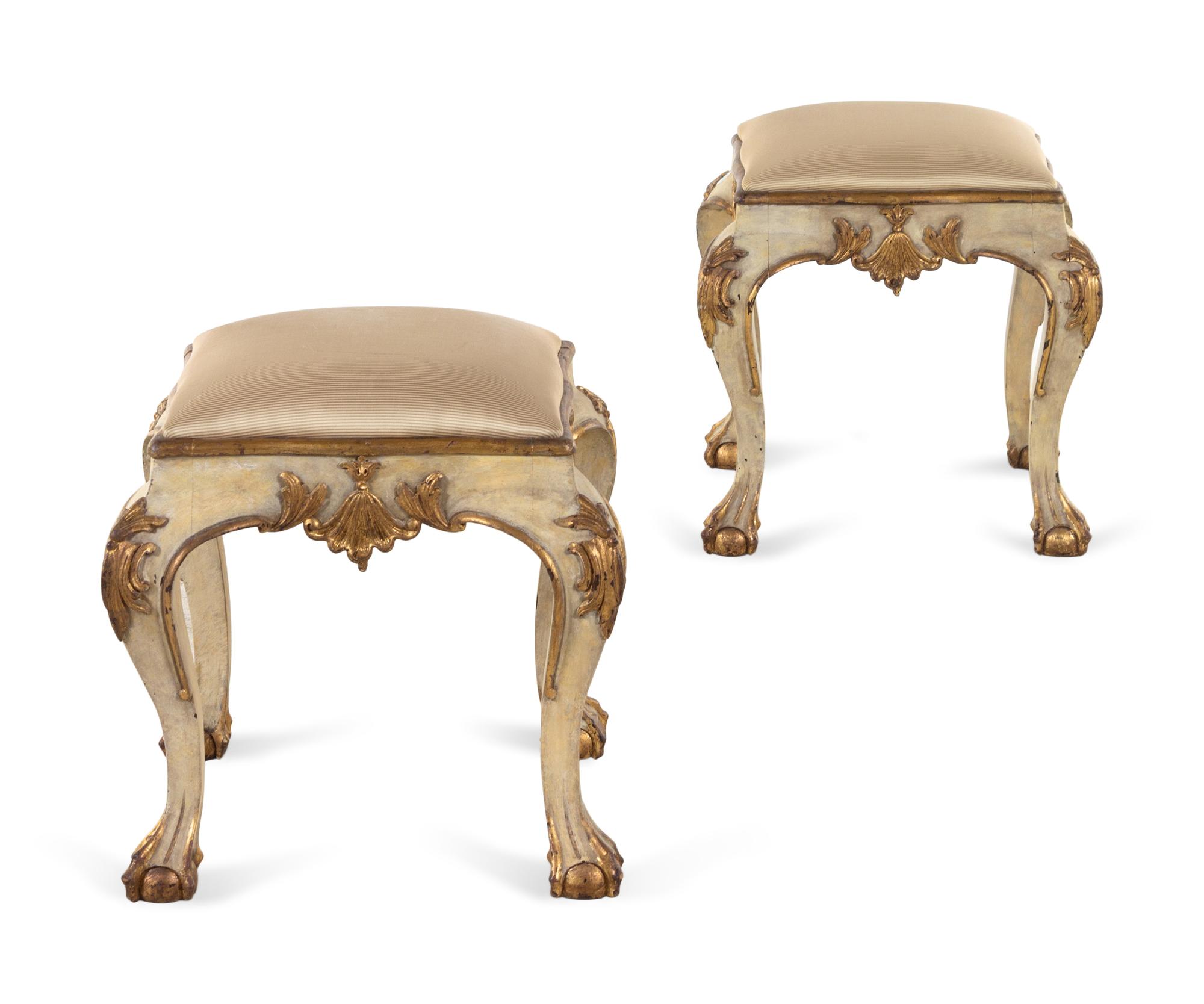 A Pair of Venetian Style Cream-Painted and Parcel Gilt Tabourets