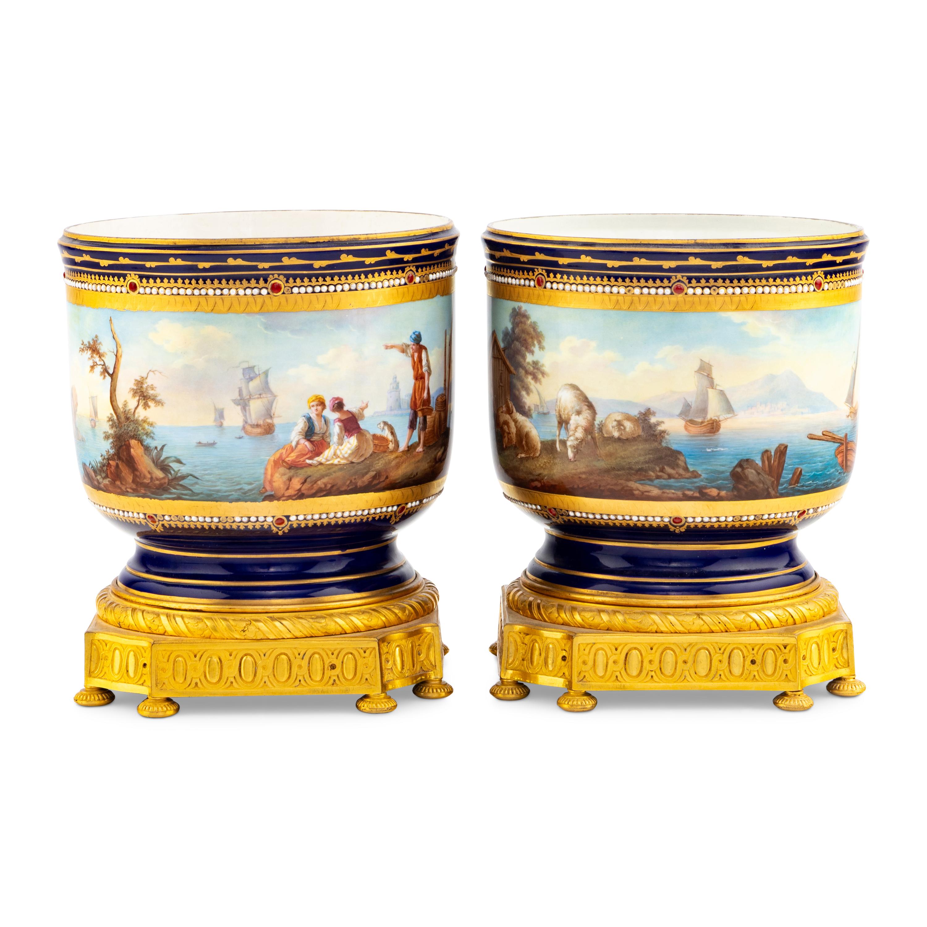 A Pair of Sèvres Style Gilt Bronze Mounted Porcelain Cache Pots