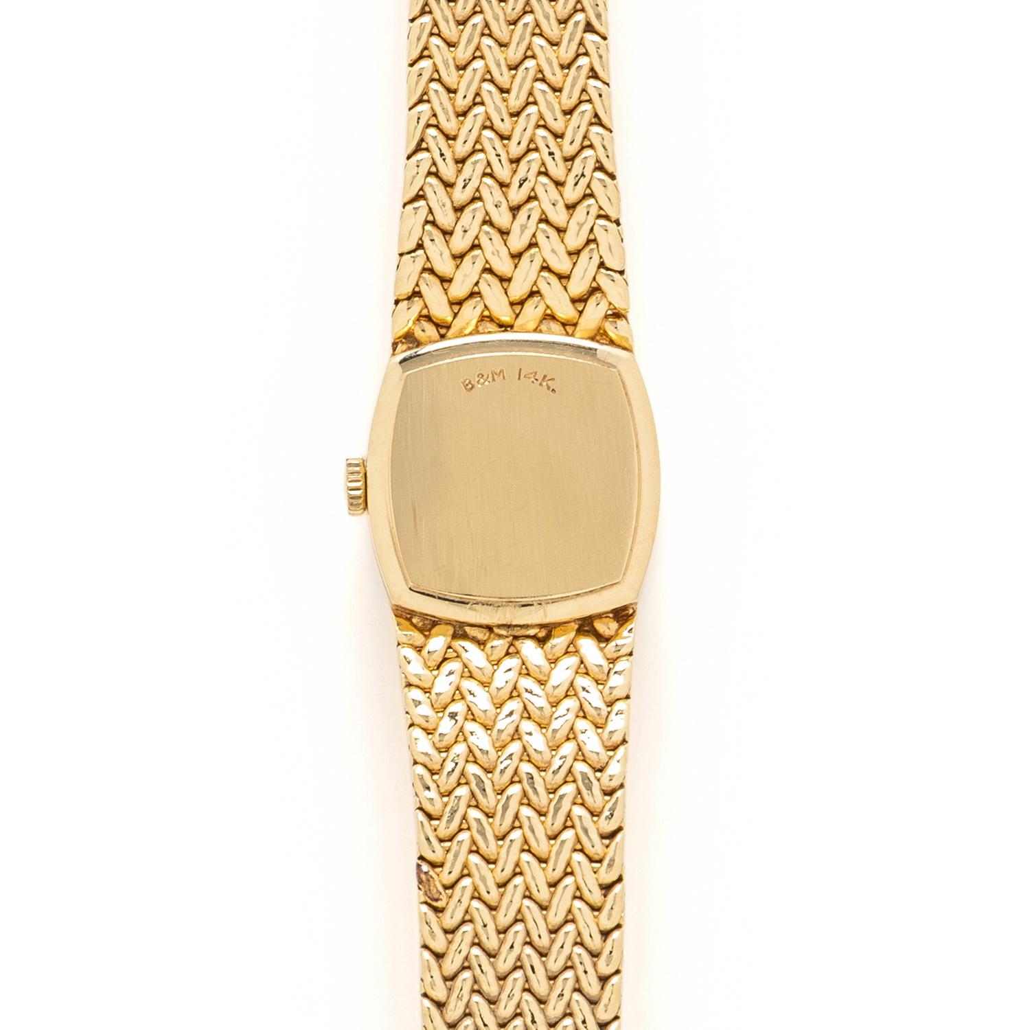 BAUME & MERCIER, YELLOW GOLD AND DIAMOND WATCH