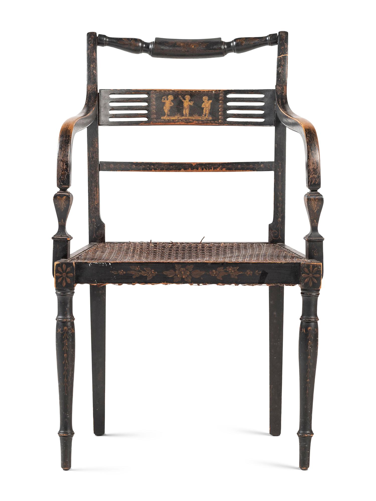 A Classical Black and Gilt Decorated Cane-Upholstered Armchair