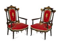 A Set of Four Black and Polychrome Chinoiserie-Decorated Chairs