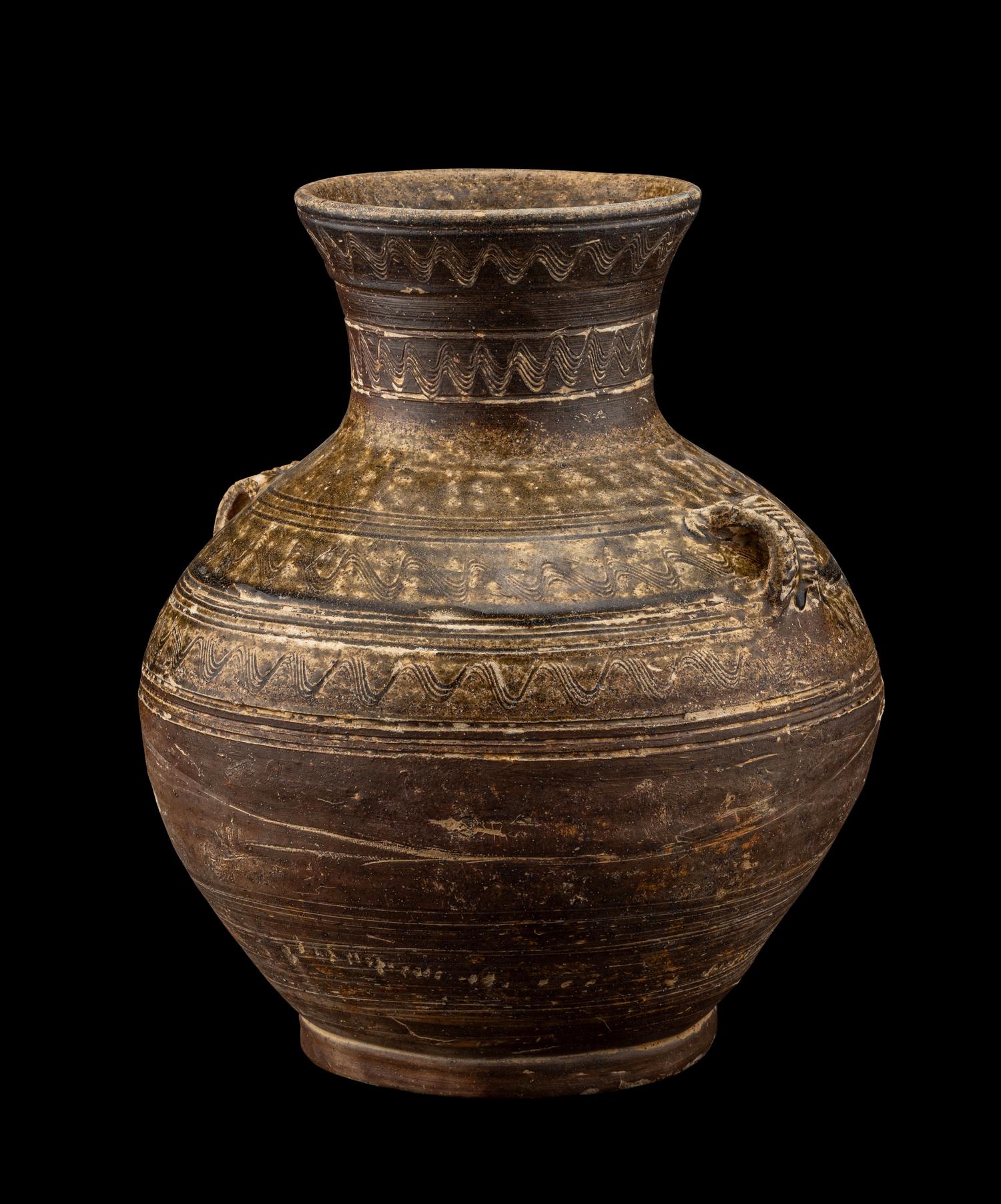 A Chinese Dark Green Glazed Pottery Handled Vase