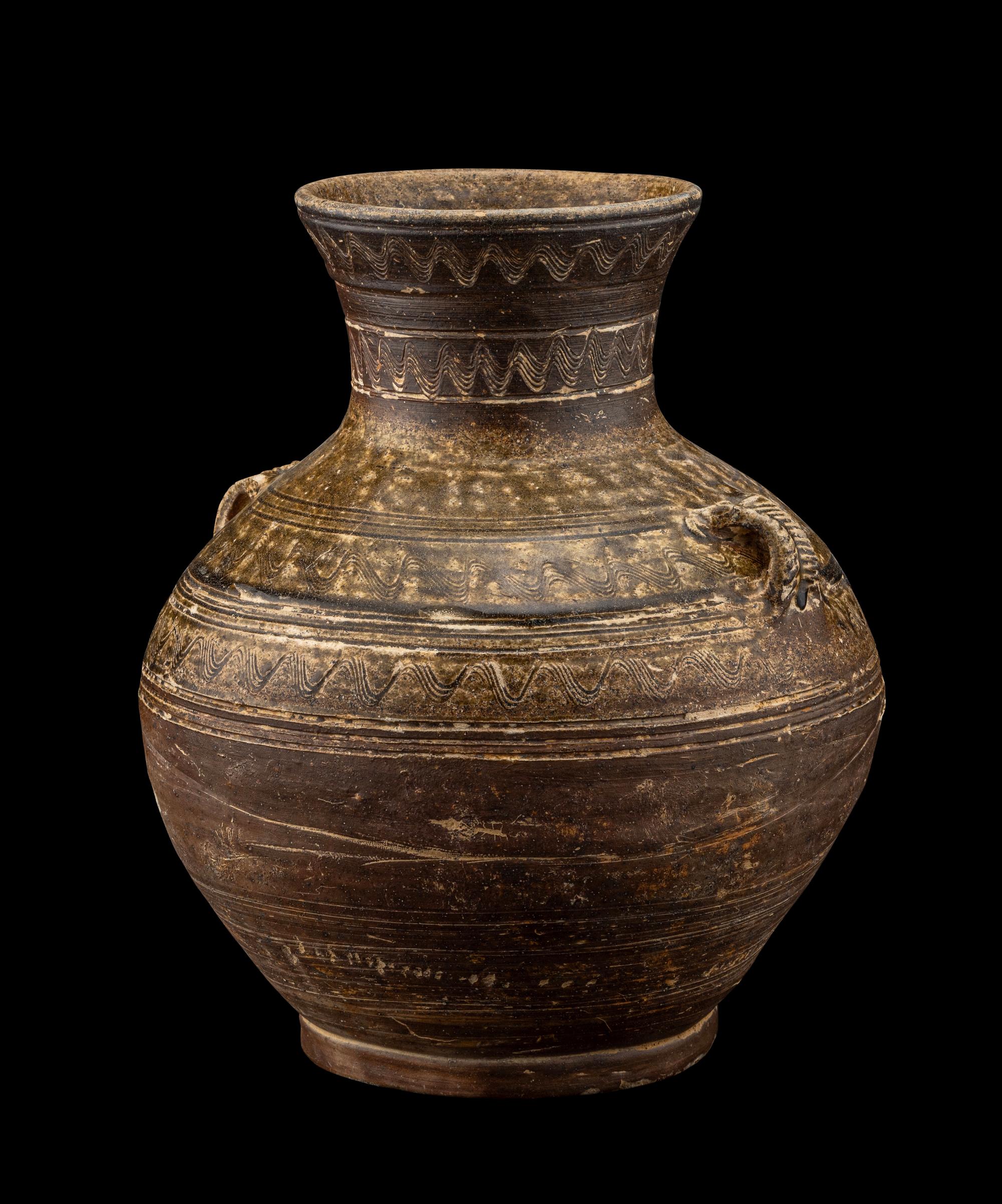 A Chinese Dark Green Glazed Pottery Handled Vase
