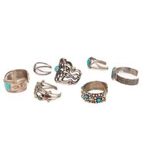 Selection of Navajo, Hopi, and Zuni Silver Bracelets and Earrings, with Inlay