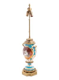 A Continental Gilt Bronze Mounted Porcelain Lamp