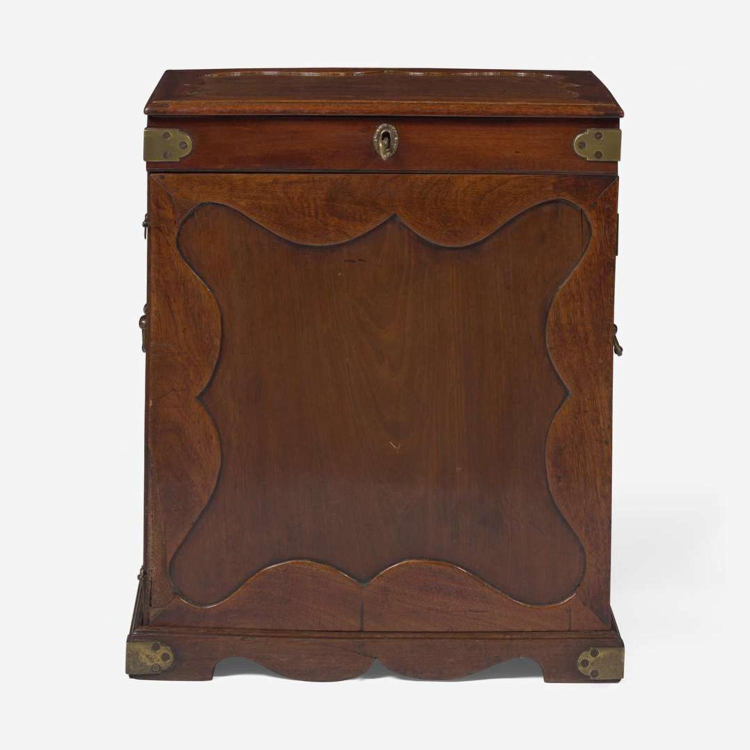 A George II carved mahogany apothecary cabinet circa 1740