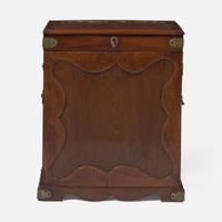 A George II carved mahogany apothecary cabinet circa 1740