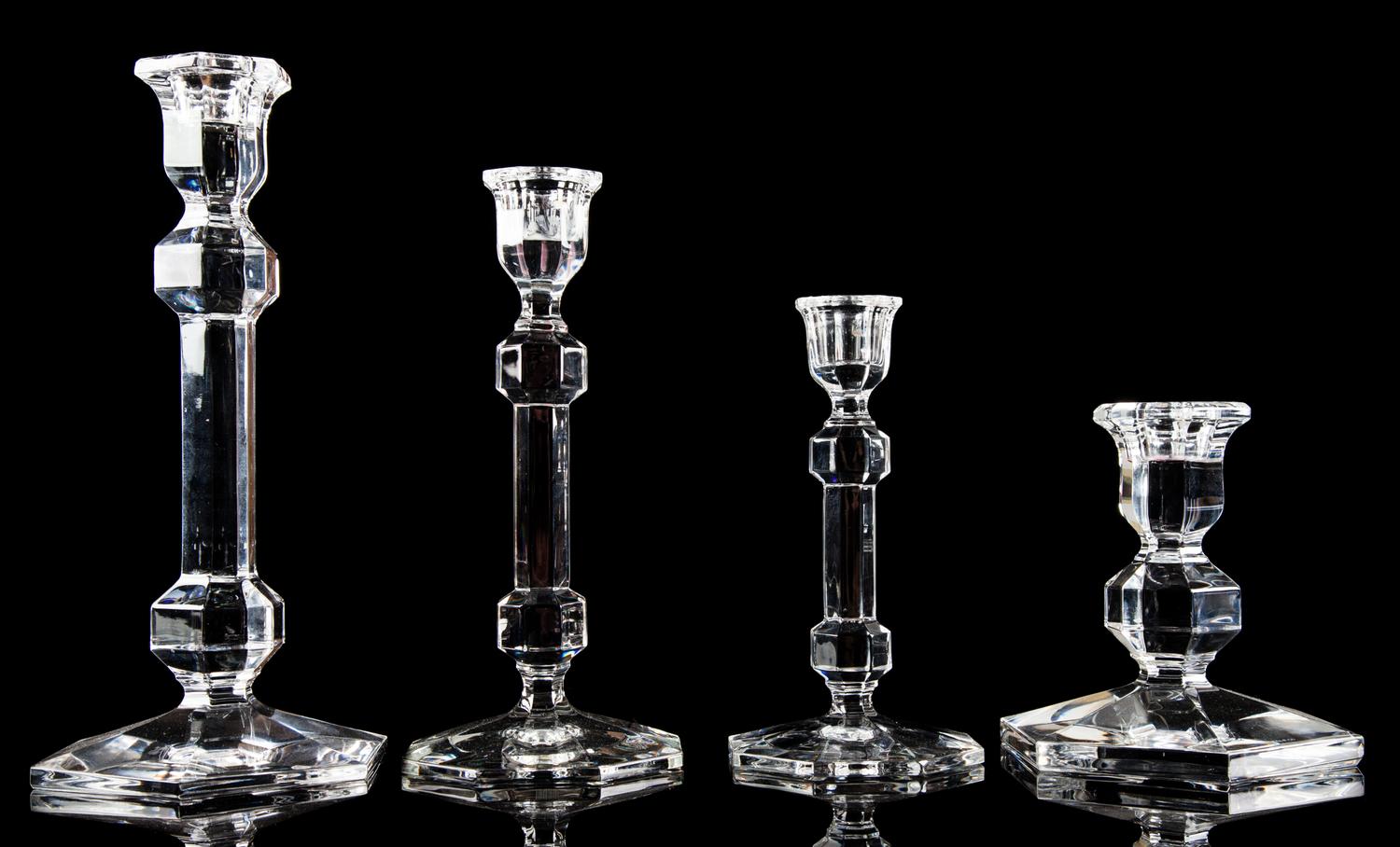 A Group of Four Glass Candlesticks Height of tallest 9 1/2 inches. — RETAILED BY TIFFANY & CO.