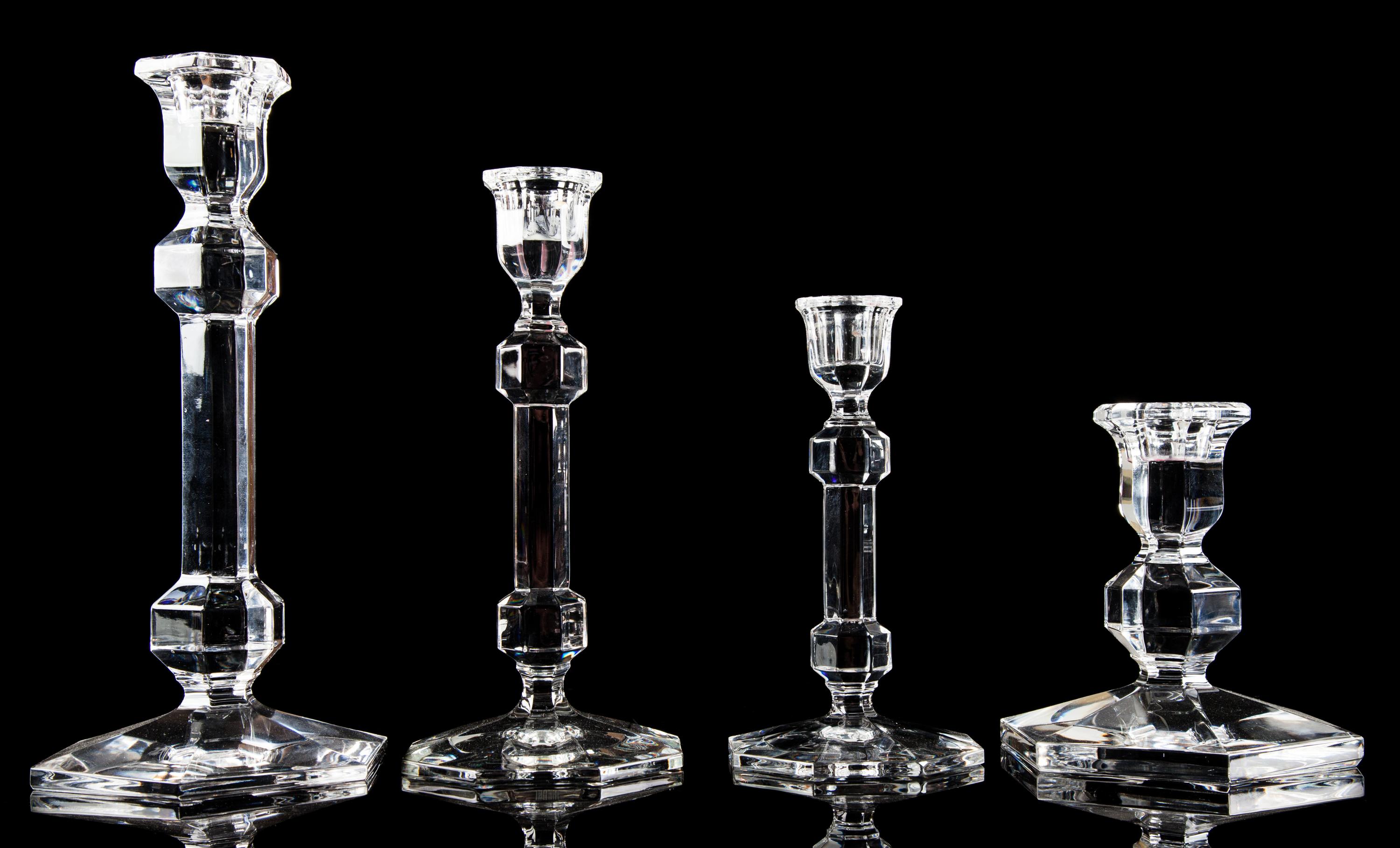 A Group of Four Glass Candlesticks Height of tallest 9 1/2 inches. — RETAILED BY TIFFANY & CO.