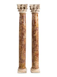 A Pair of Carved Limestone Capitals with Breccia Marble Columns