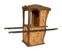 A Venetian Carved and Painted Giltwood Sedan Chair