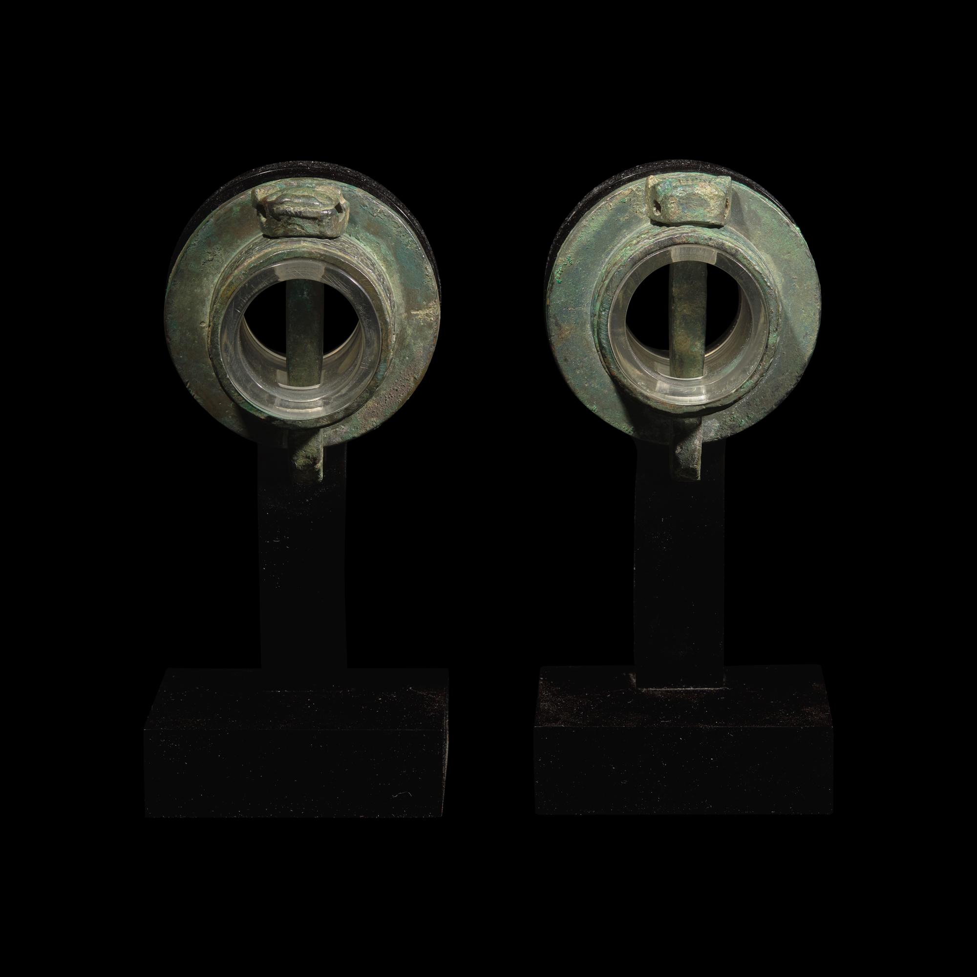 A Pair of Chinese Bronze Chariot Fittings 青銅獸面紋車軎