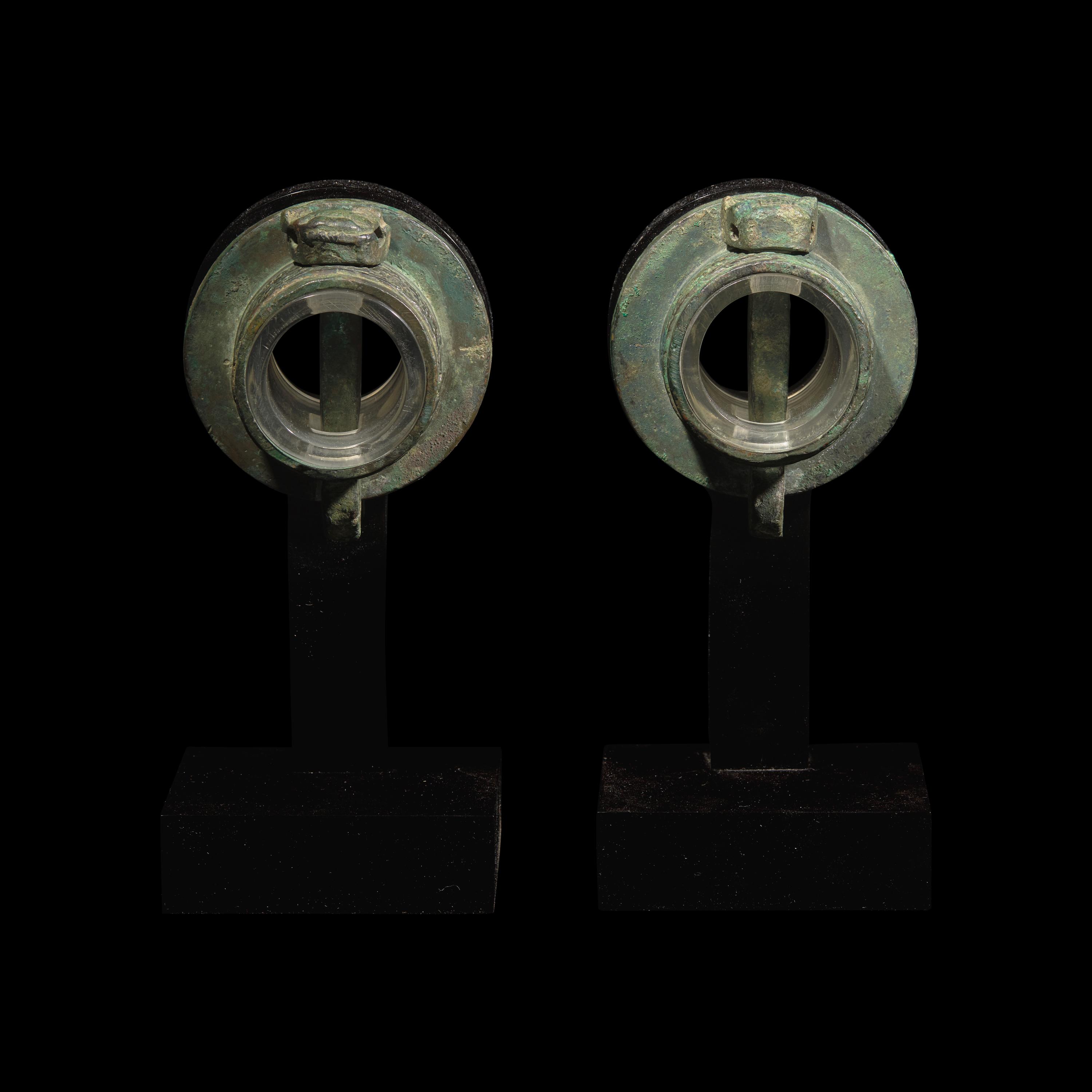A Pair of Chinese Bronze Chariot Fittings 青銅獸面紋車軎