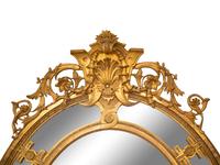 A Napoleon III Giltwood Oval Mirror
