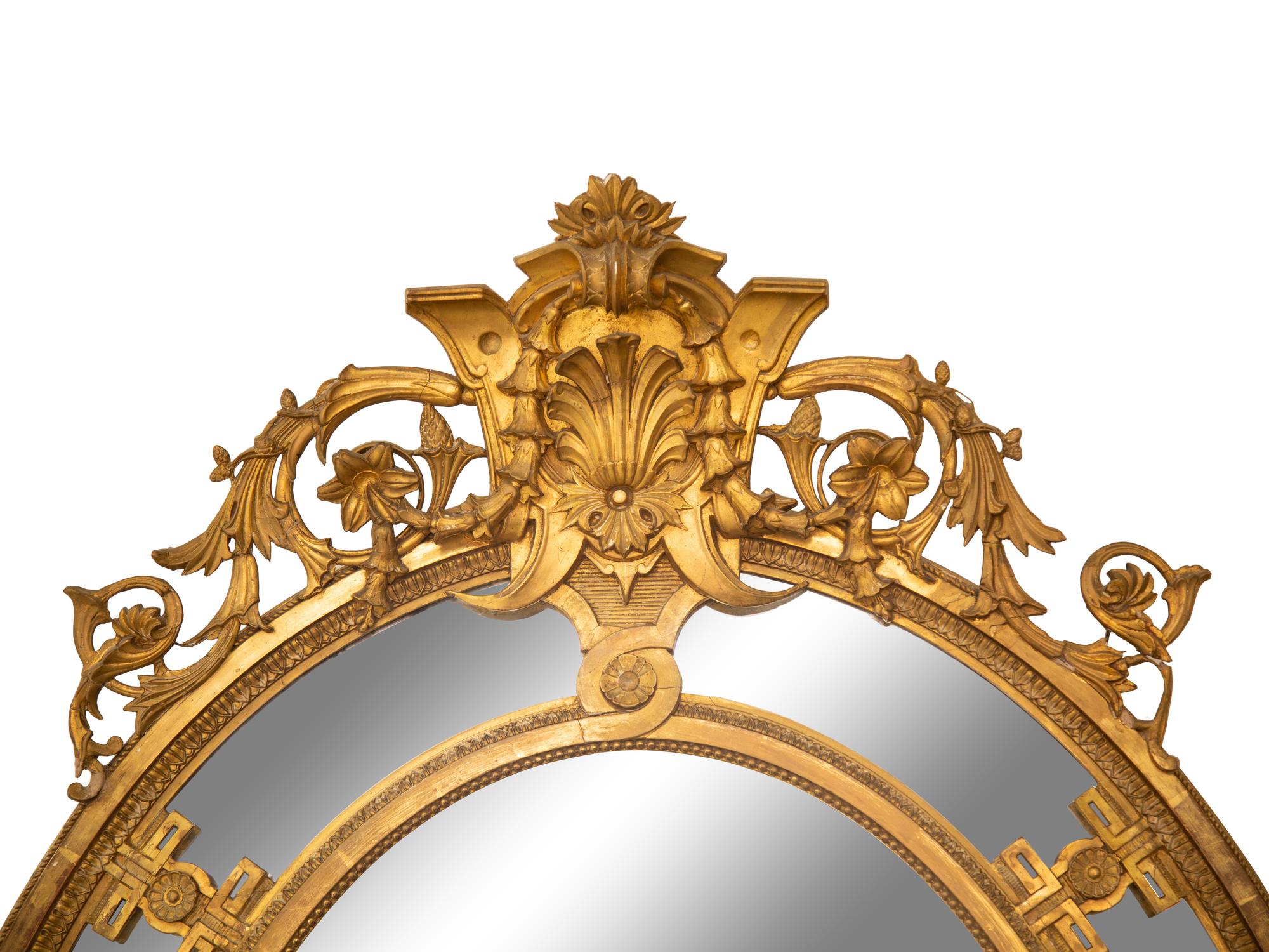 A Napoleon III Giltwood Oval Mirror