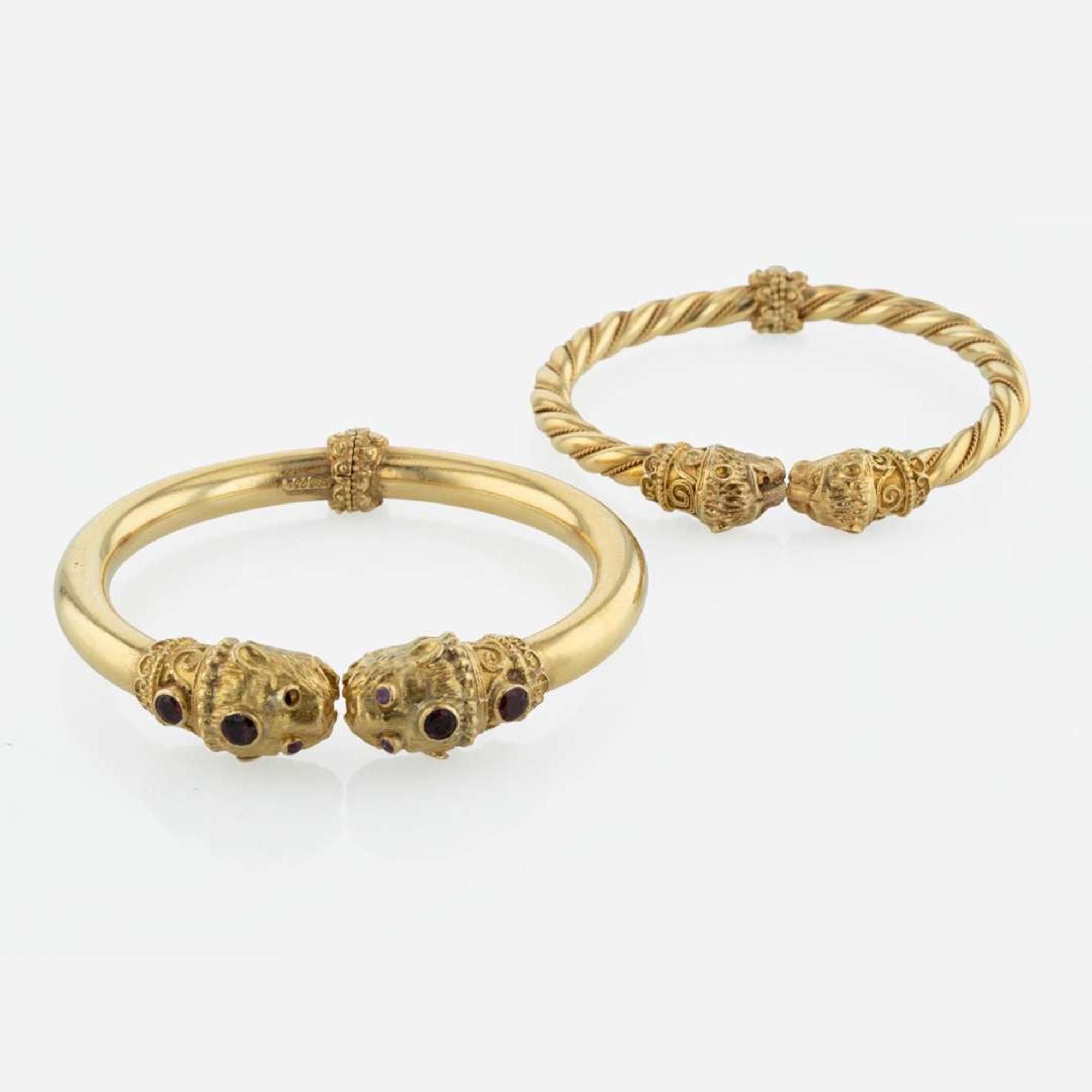 A Pair of Two Etruscan Style Bangle Bracelets