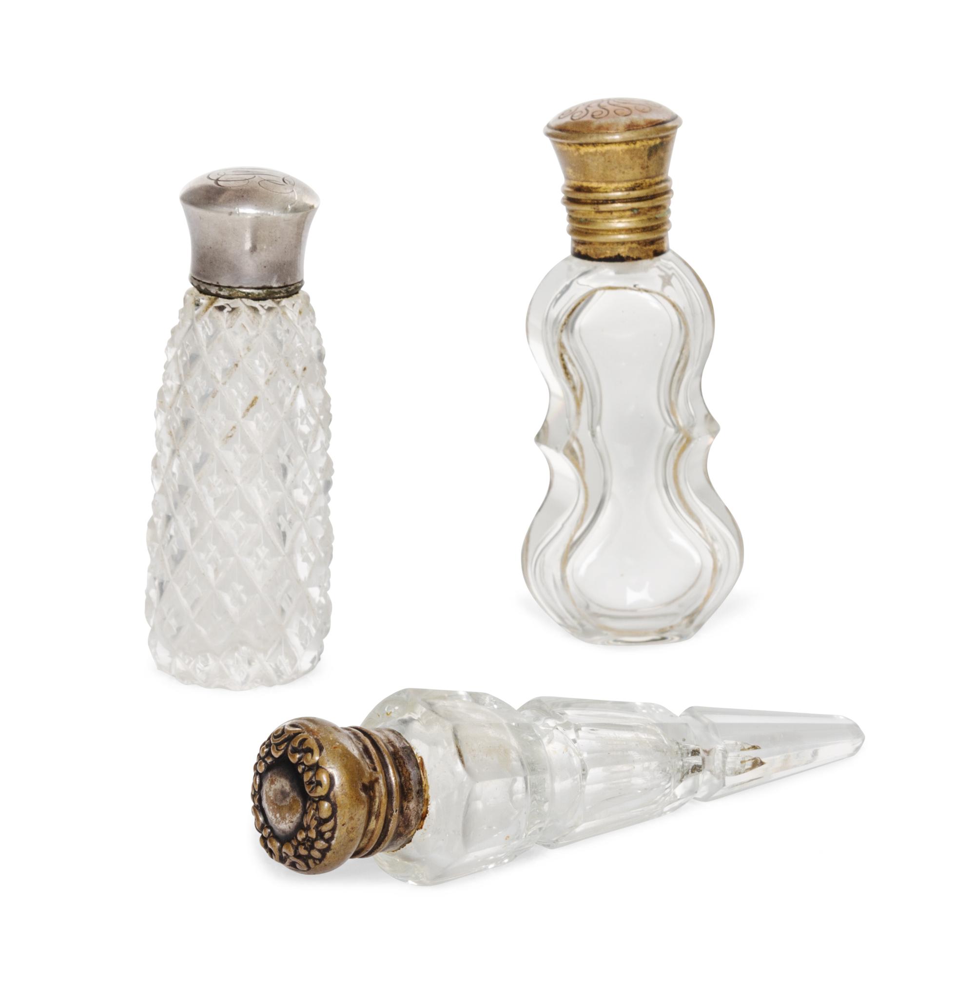 Three Cut and Molded Glass Scent Bottles, 19th/20th Century, of various forms and sizes.