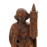 A Continental Carved Oak Figure of Saint Barbara with an Associated Altar Niche