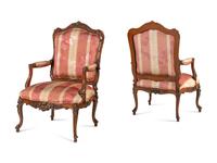 A Pair of Louis XV Style Walnut Fauteuils