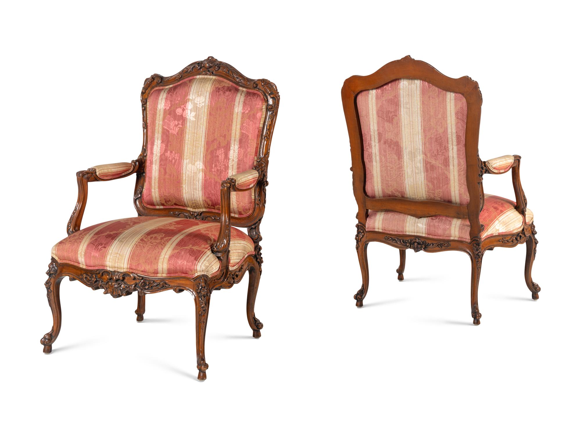 A Pair of Louis XV Style Walnut Fauteuils