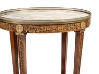 A Louis XVI Style Gilt Bronze Mounted Marble Top Mahogany Guéridon
